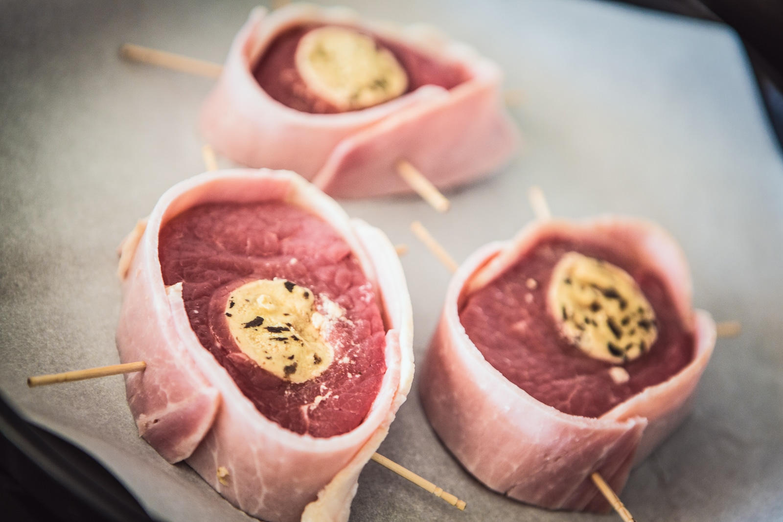 Veal Migono with mushroom butter wrapped in bacon