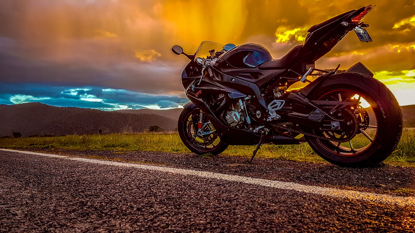 BMW RR1000S in the rain enjoying the sunset