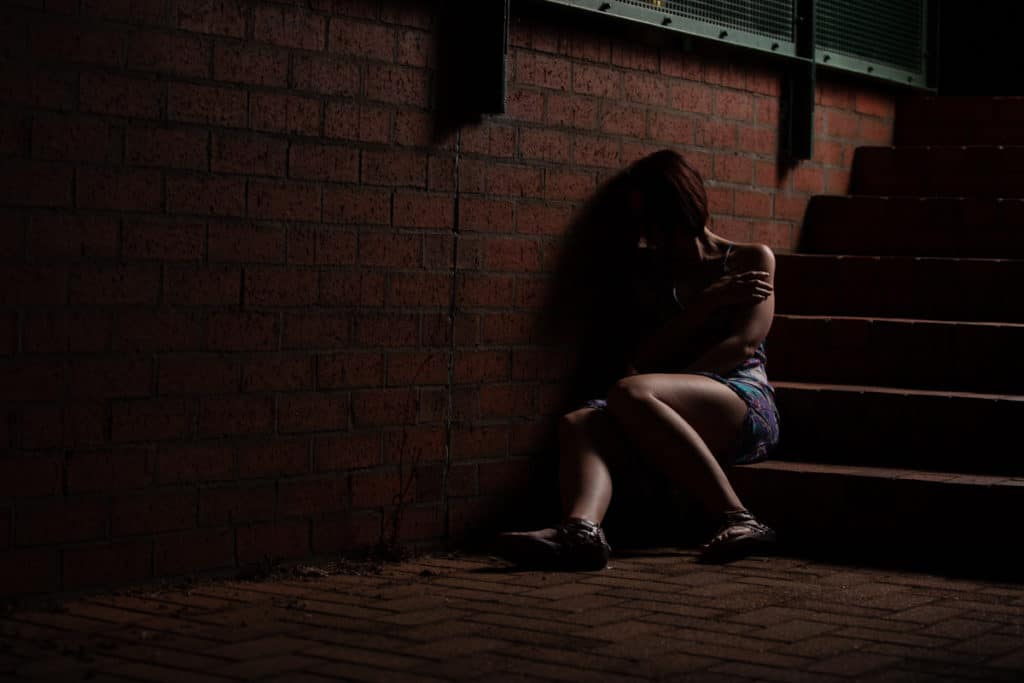 Before Woman on stairs