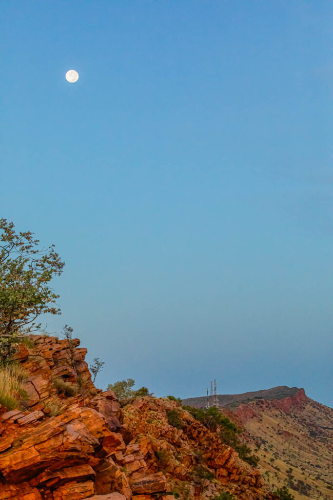 Mt Gillen at Alice Springs with a full moon setting in the background