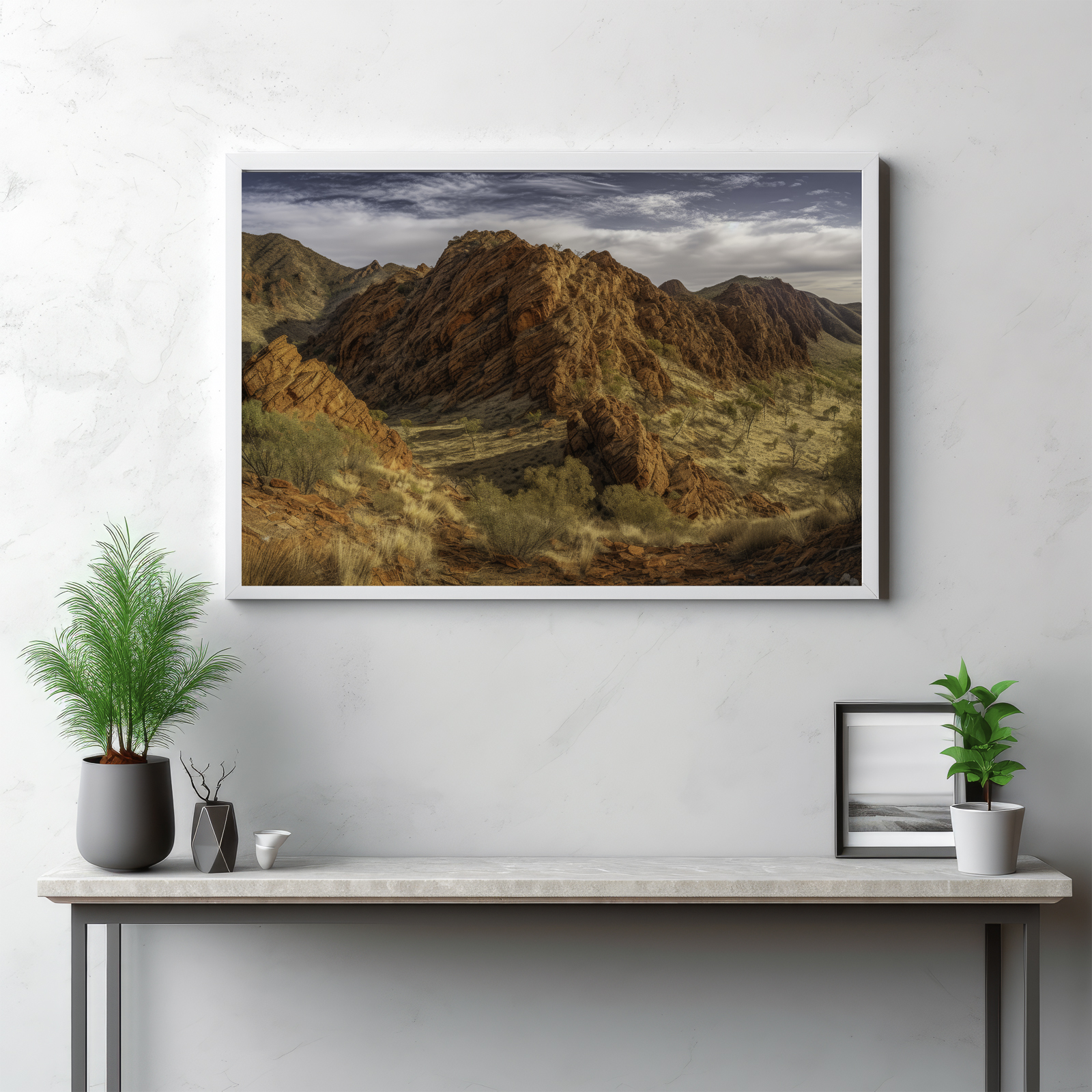 Embark on a visual journey through the MacDonnell Ranges with this impressive panoramic capture. The image presents a captivating interplay of towering peaks, expansive valleys, and the raw wilderness that stretches infinitely. This is more than an outdoor view—it's a celebration of the grandeur of nature, the allure of the mountains, and the untamed beauty of the Australian outback. Let this panorama invite you into the heart of the wild, where the majestic dialogue between peak and valley unfolds in all its glory.