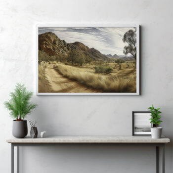Traverse the serene landscapes of the MacDonnell Ranges with this panoramic depiction. The image unfolds a mesmerizing vista where the desert meets the grasslands, guided by a trail that seems to stretch infinitely into the wilderness. This outdoor scene is more than just a view—it's a testament to the raw beauty of nature and the grandeur of the Australian outback. Allow this panorama to inspire you to explore new paths, venturing into the heart of the wild and appreciating the spellbinding simplicity of nature's artistry.