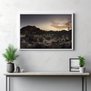 Dive into the untamed wilderness of the MacDonnell Ranges with this powerful depiction. This image captures the sweeping expanses of this rugged landscape, set under the infinite canvas of the sky. The scene is an unfiltered view of nature's raw beauty, from the detailed textures of the ground to the vast outdoor panorama. An undeniably striking scene, this image takes you on a journey through Australia's scenic heart, inviting you to witness the sublime interplay of nature and wilderness. It's not just a landscape—it's a snapshot of the world's wild beauty.
