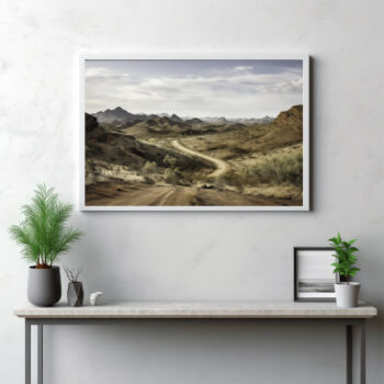Embark on an unforgettable journey with this panoramic image of the MacDonnell Ranges. The scene presents a winding road that cuts through the rugged landscape, inviting you into the expansive wilderness. This is more than a landscape—it's a call to adventure and exploration, showcasing the captivating allure of the Australian outback. Allow this image to guide you along the road less travelled, a pathway that weaves through the grandeur of the MacDonnell Ranges, opening up a world of mesmerizing scenery.