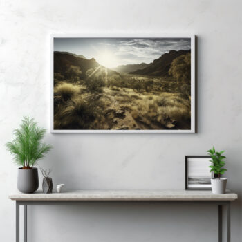 Step into the enchanting realm of the MacDonnell Ranges with this panoramic image. It gracefully captures the lush vegetation illuminated by the radiant sunlight against the backdrop of the boundless wilderness. This isn't just an outdoor view—it's a vibrant, sun-kissed portrayal of the Australian outback. Let this panorama draw you into the world of the MacDonnell Ranges, where nature thrives in its full glory, revealing the harmony between sun, earth, and the flourishing vegetation.